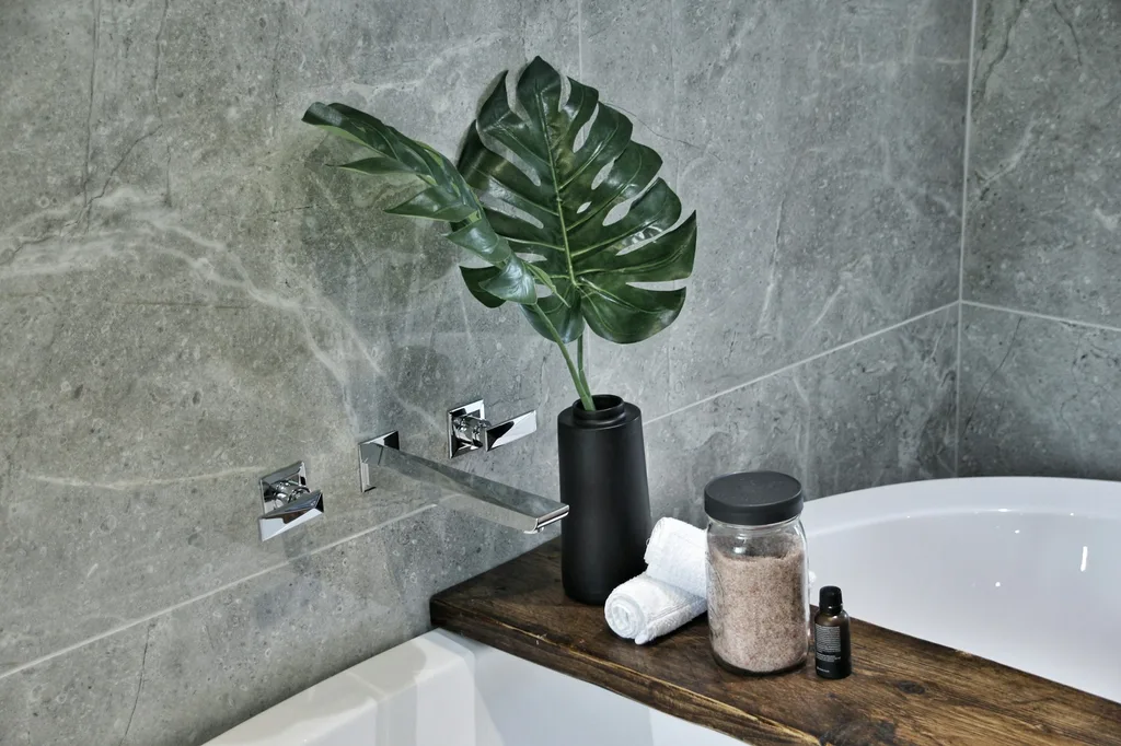 Bathroom refurbishment for landlord property showing tile and fixture quality
